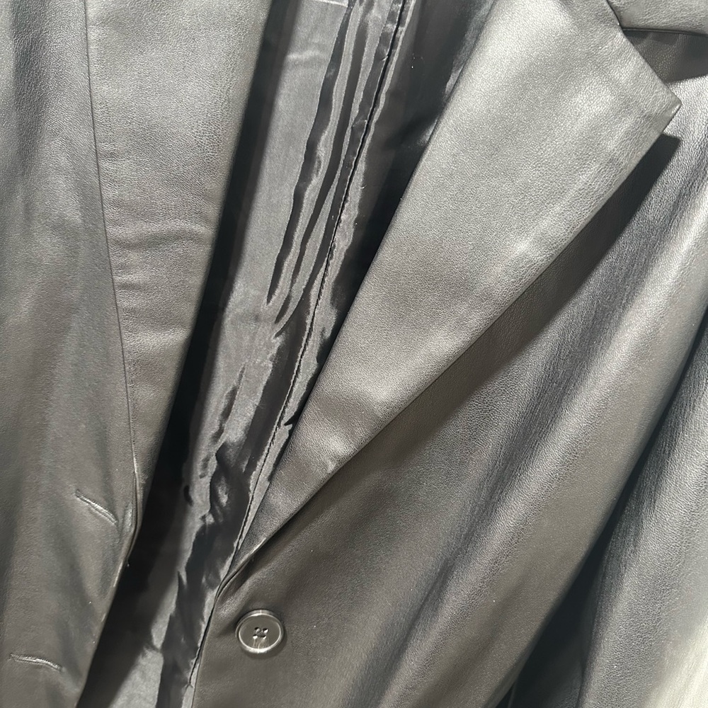 It’s a used faux leather blazer